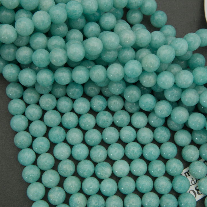Close-up of turquoise beads on a dark background