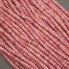 Natural pink rondelle gemstone beads with subtle color variation