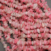 Close-up of pink and white stones on a gray background