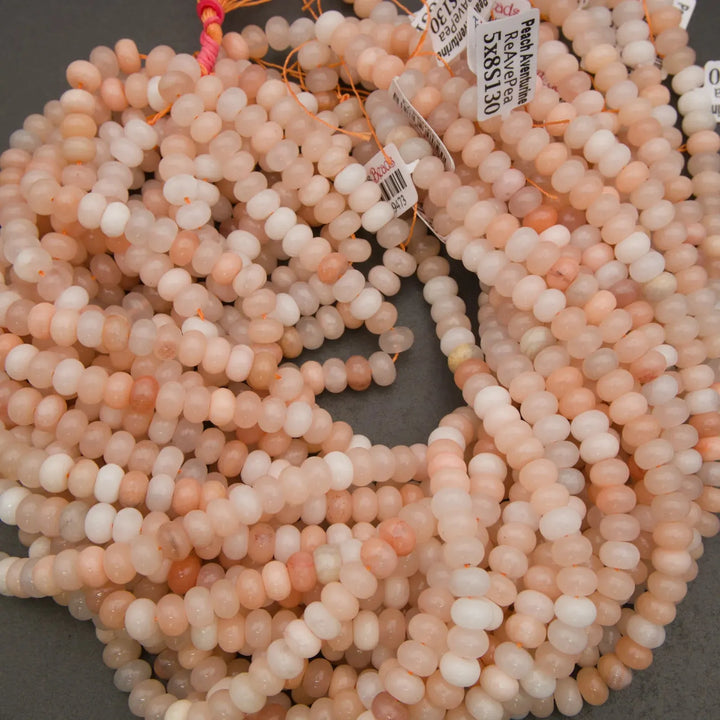Natural stone Peach Aventurine beads with subtle translucency and polish.