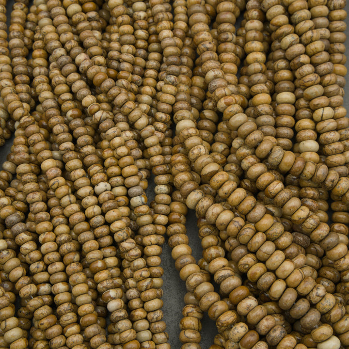Close-up of brown beads on a dark background
