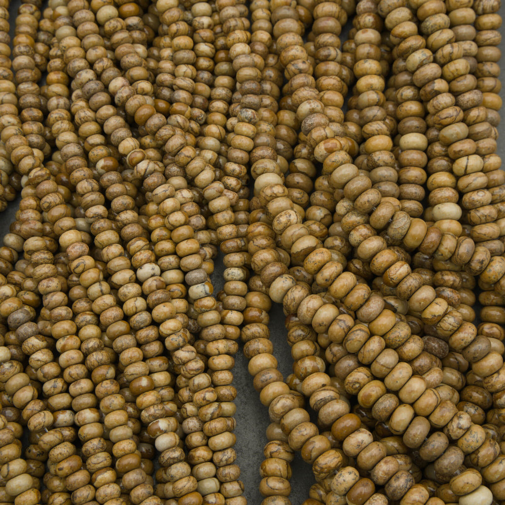 Close-up of brown beads on a dark background