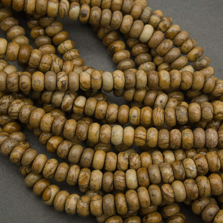Close-up of brown beads on a gray background