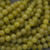 Olive jade polished round beads.