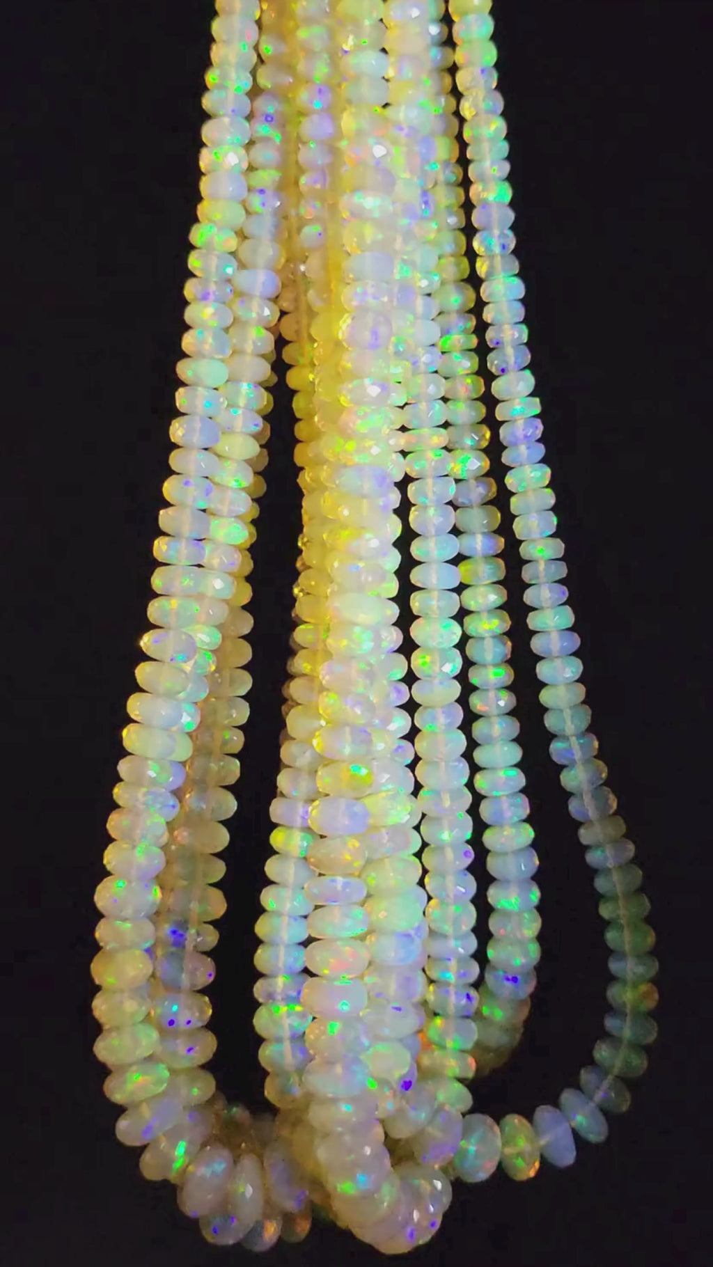 Ethiopian Opal Beads Spinning and Flashing.