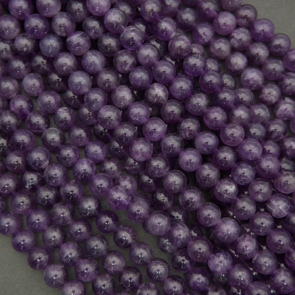Close-up of purple beads on a dark background