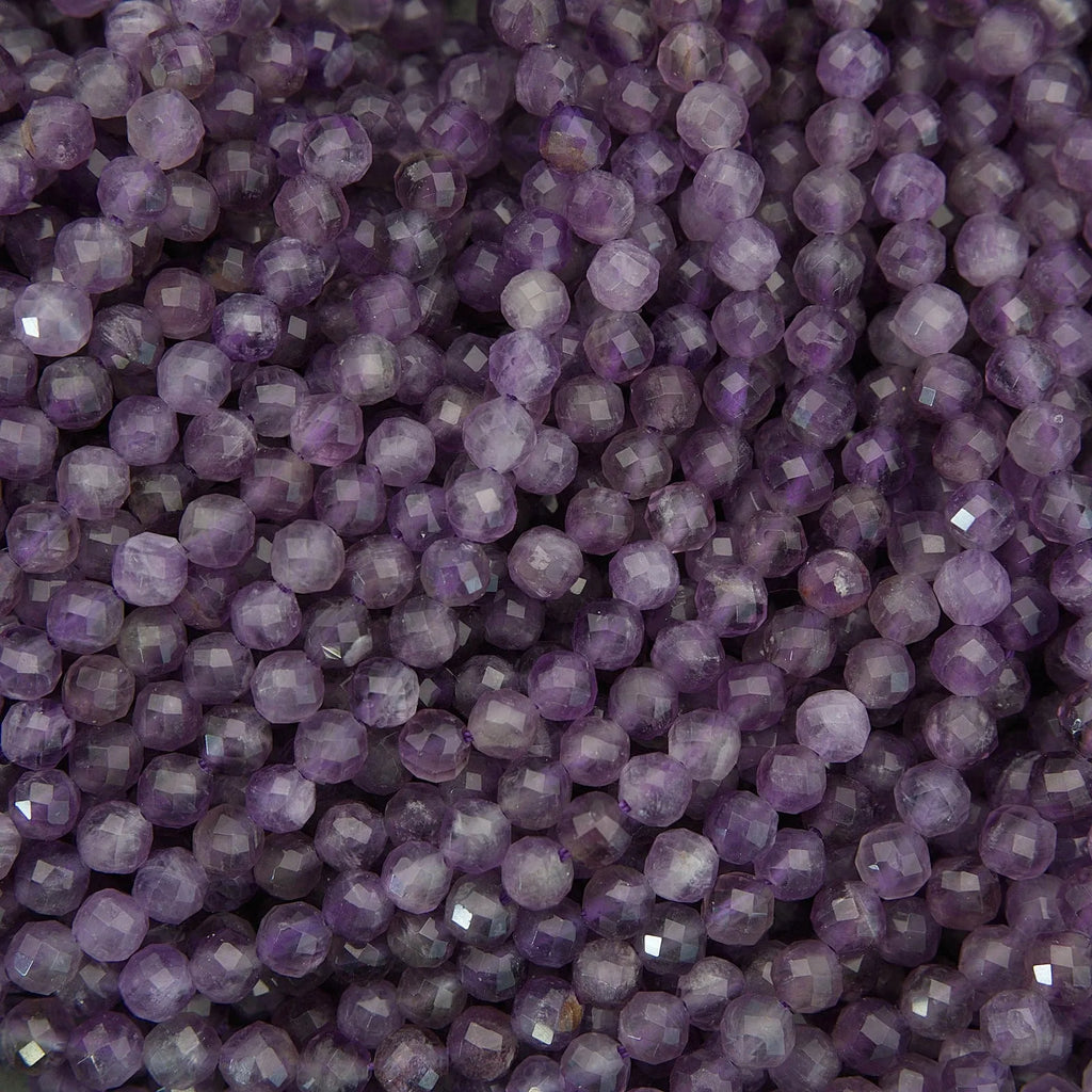 Close-up of purple beads with a faceted surface