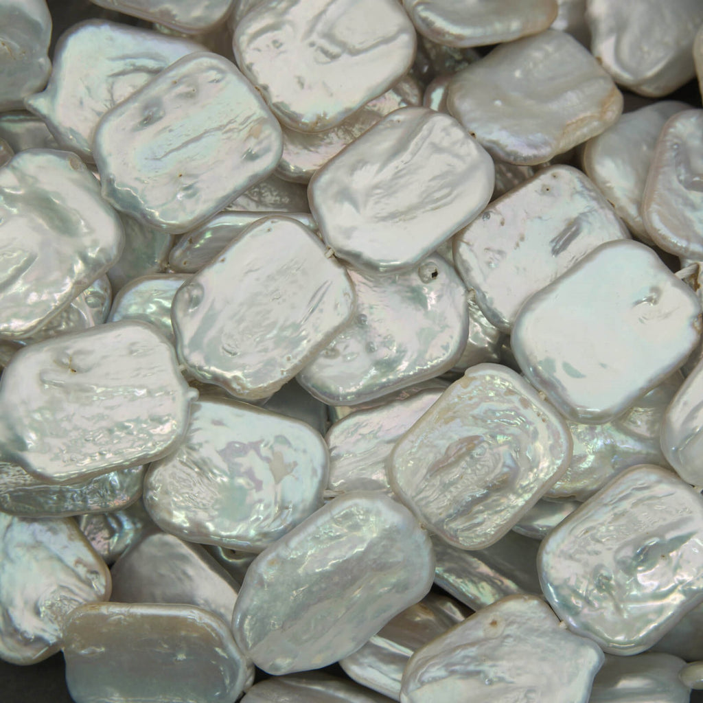 Close-up of white pebbles with a soft focus