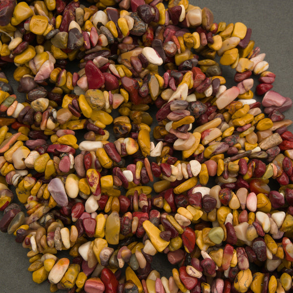 Close-up of multicolored pebbles on a gray background