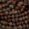 Close-up of dark brown stone beads.