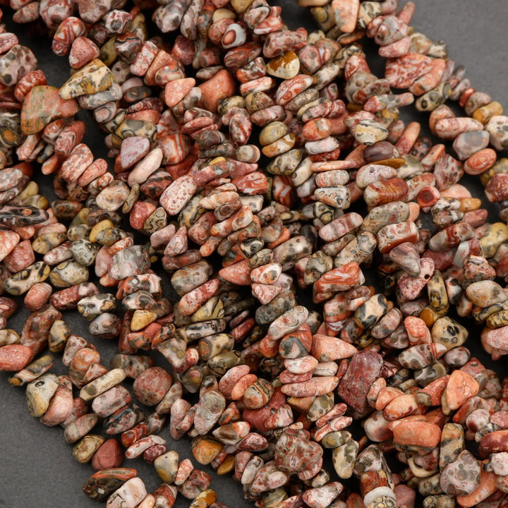 Close-up of multicolored pebbles on a dark surface