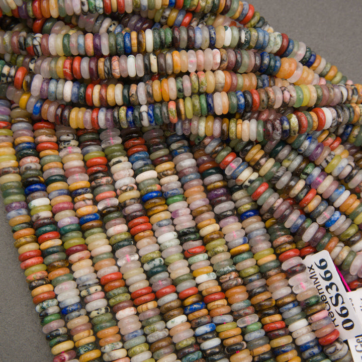 Assorted polished gemstone rondelle beads in a wide range of colors