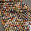 Assorted polished gemstone rondelle beads in a wide range of colors