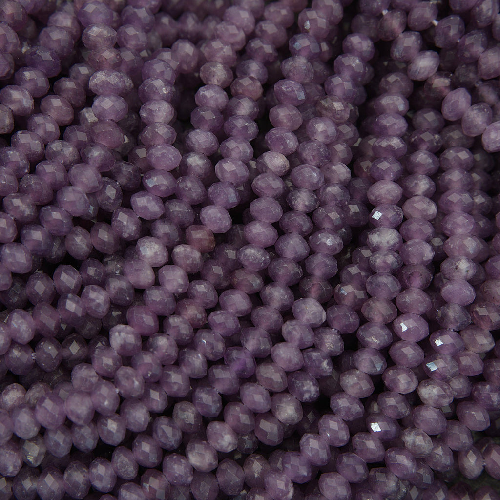 Close-up of purple beads with a textured surface