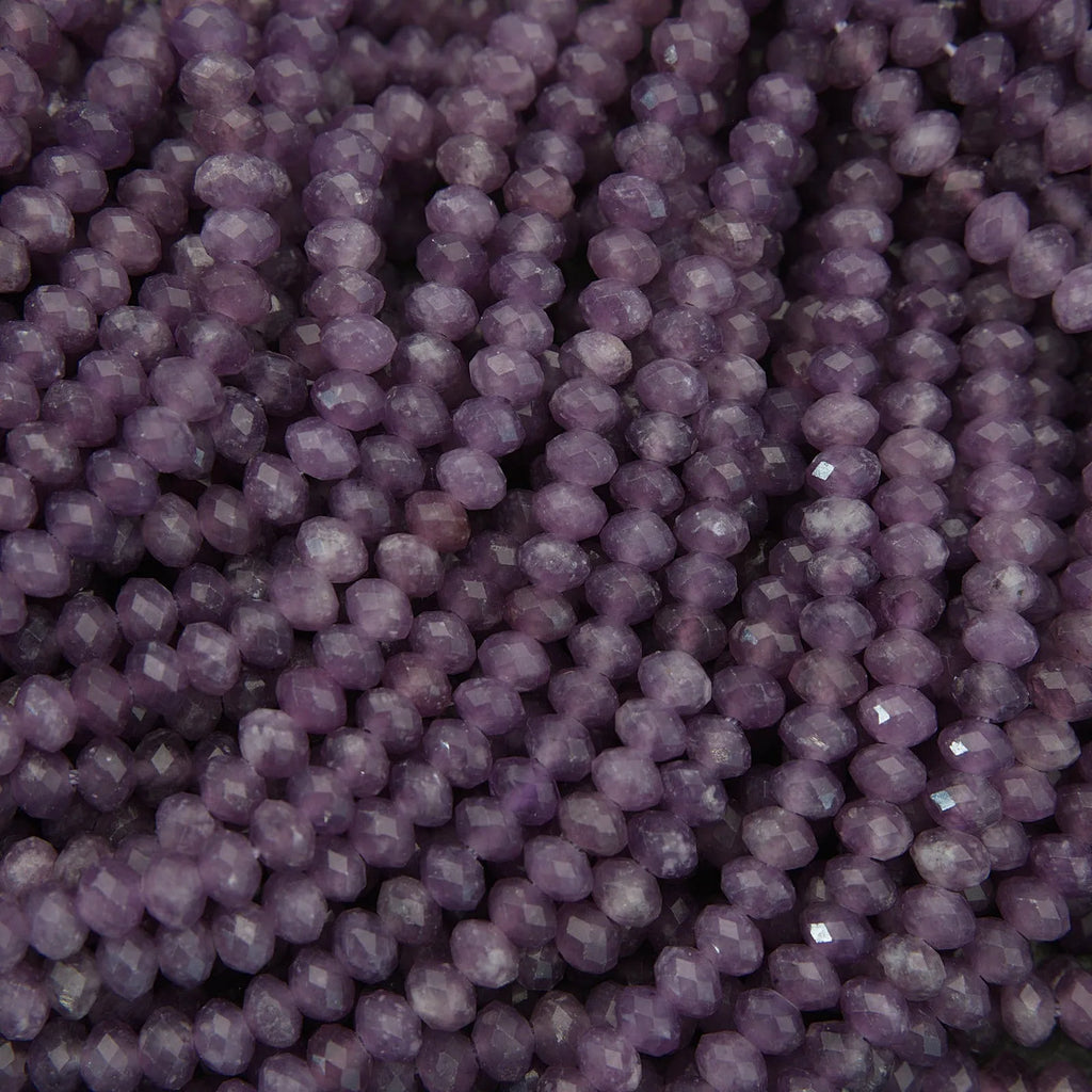 Close-up of purple beads with a textured surface