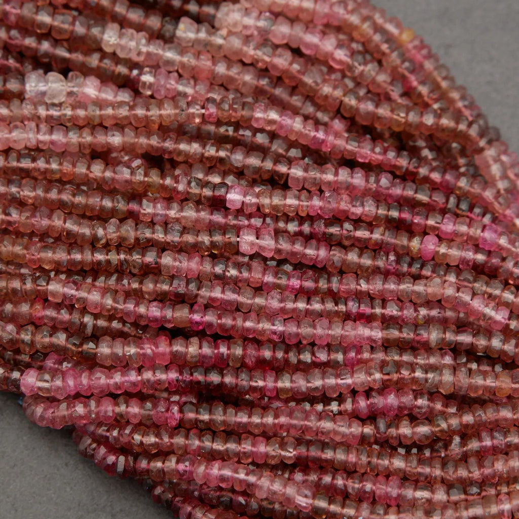 Close-up of pink beads on a gray background