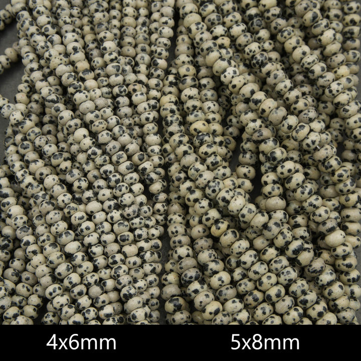 Close-up of small beads with size specifications 4x6mm and 5x8mm.