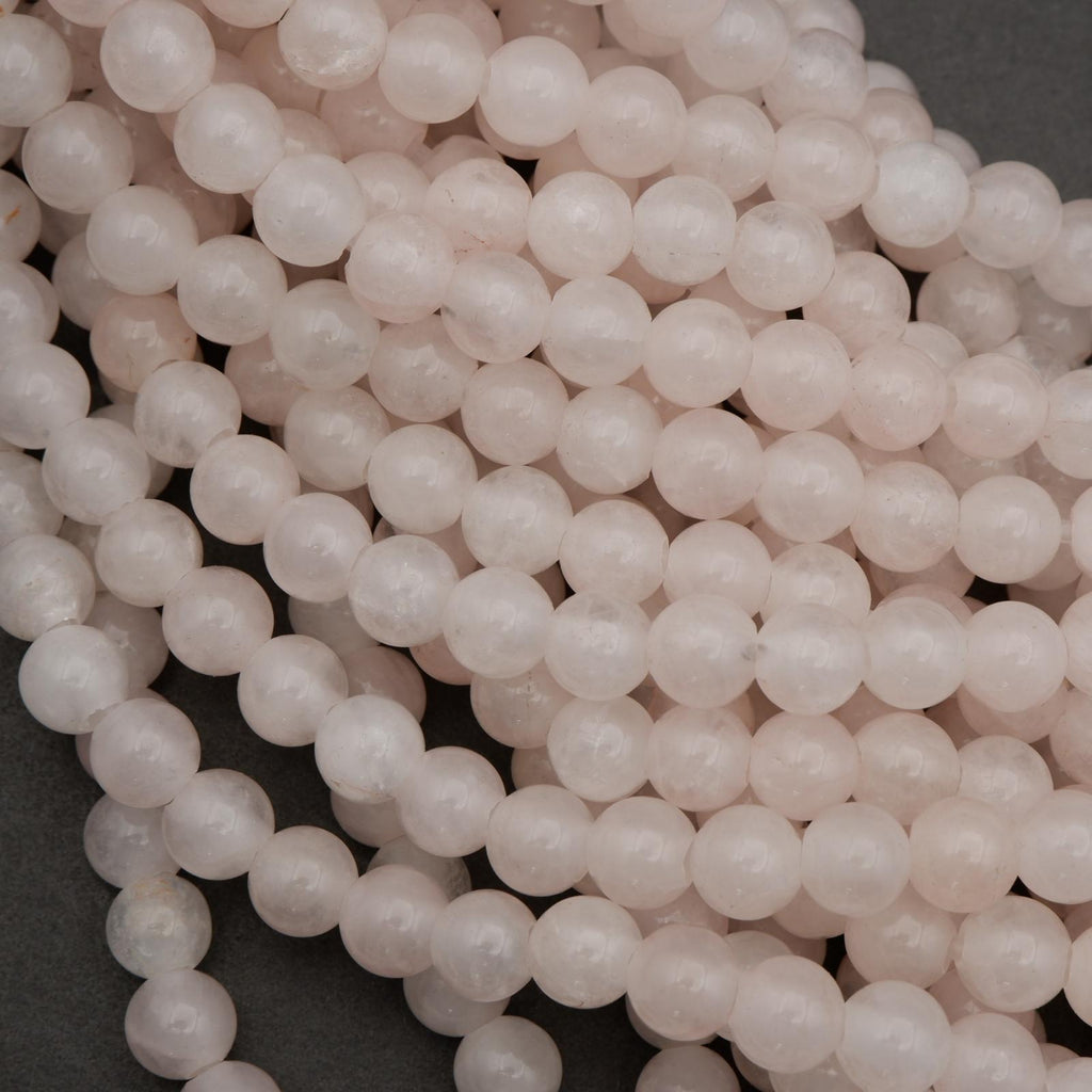 Close-up of pink pearls on a dark background