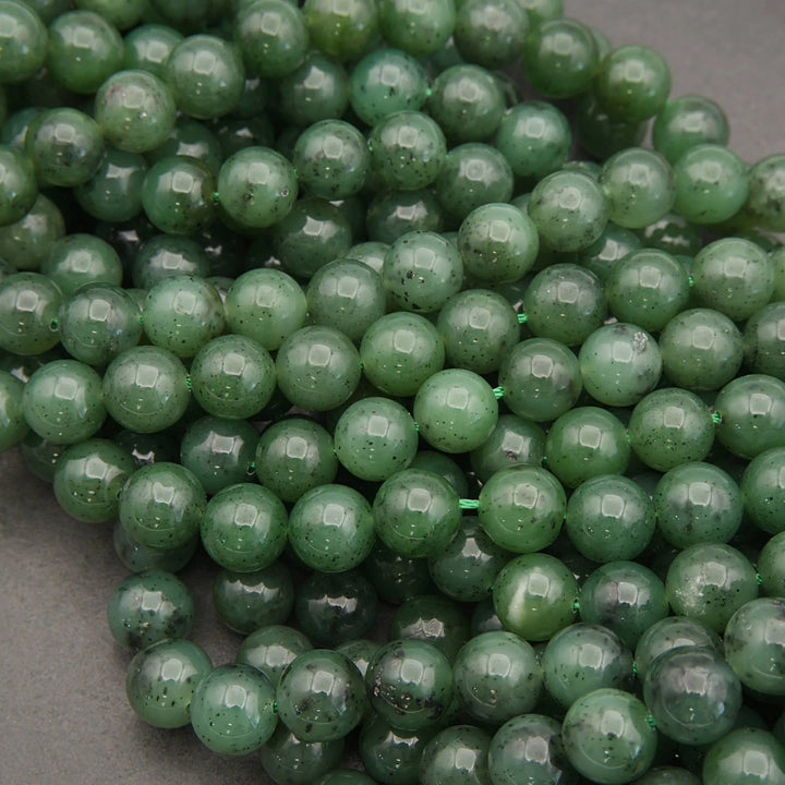 Close-up of green beads on a gray background