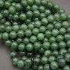 Close-up of green beads on a gray background