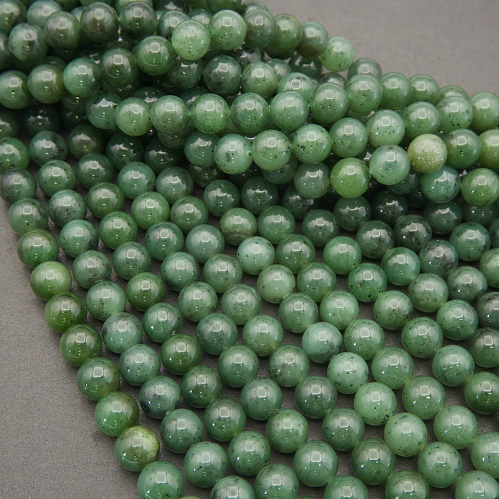 Close-up of green beads on a gray background