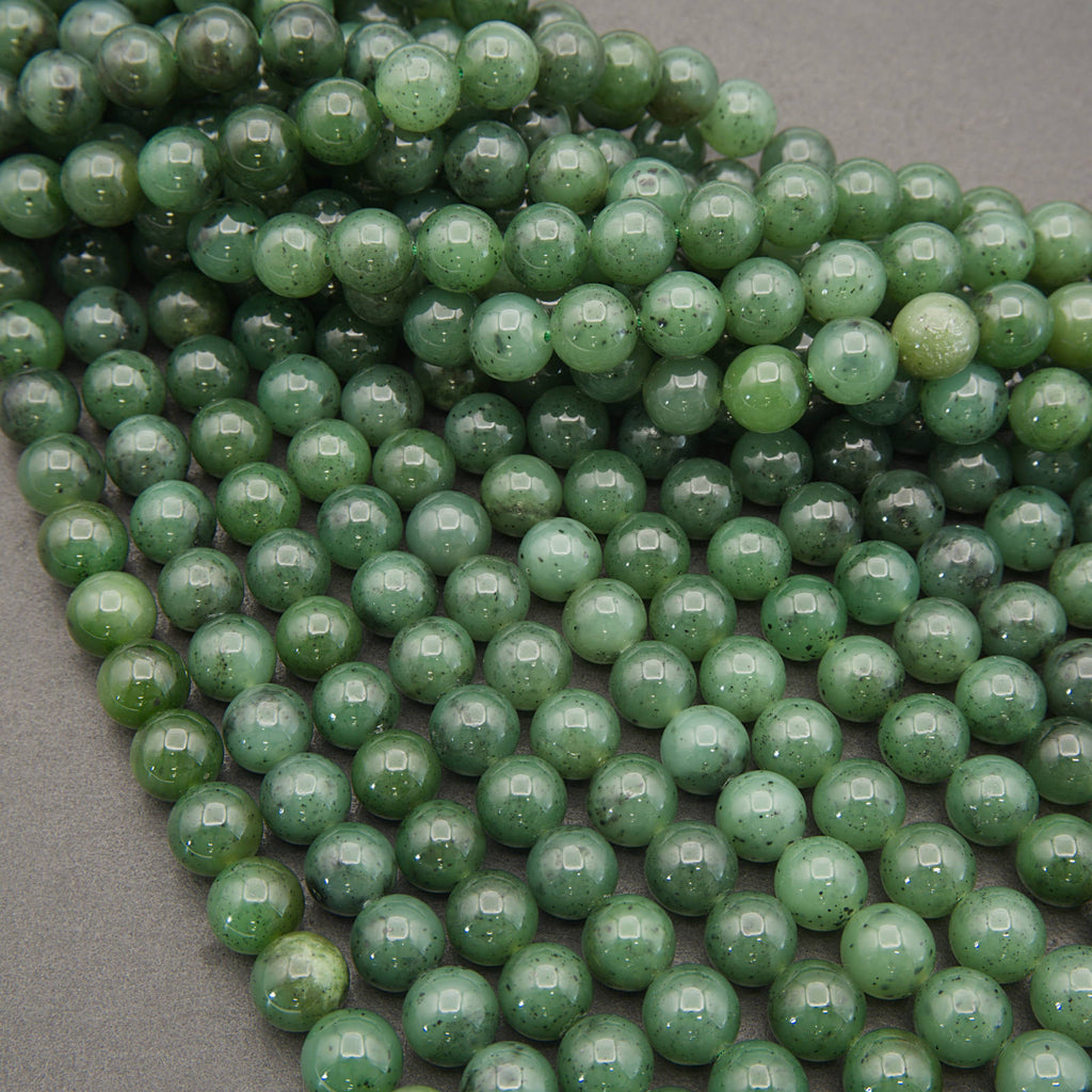 Close-up of green beads on a gray background