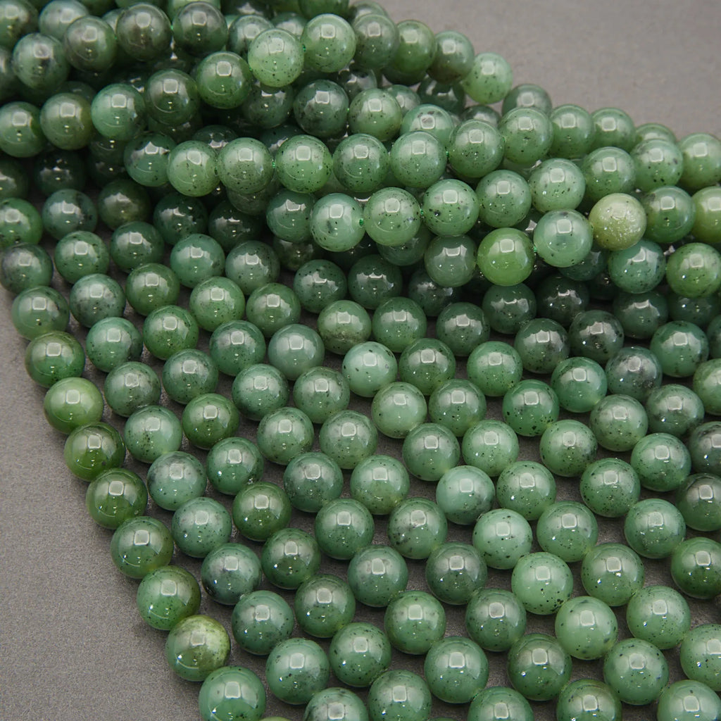 Close-up of green beads on a gray background