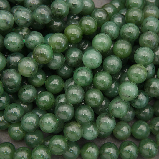 Close-up of green beads on a gray background