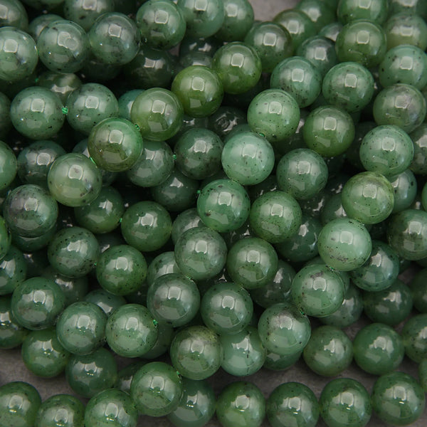 Close-up of green beads on a gray background