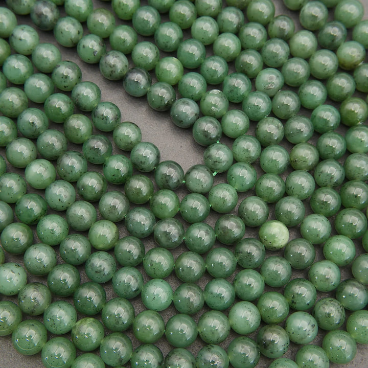 Close-up of green beads on a gray background