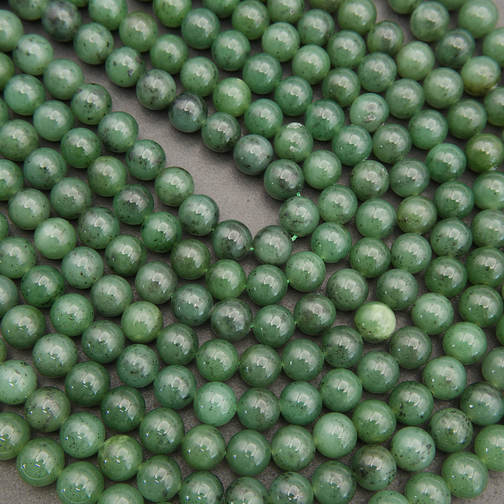 Close-up of green beads on a gray background