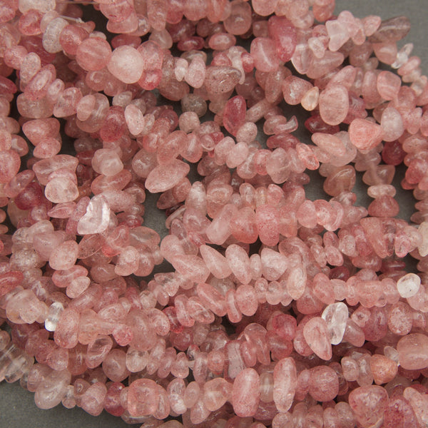 Close-up of pink stone chips on a gray background