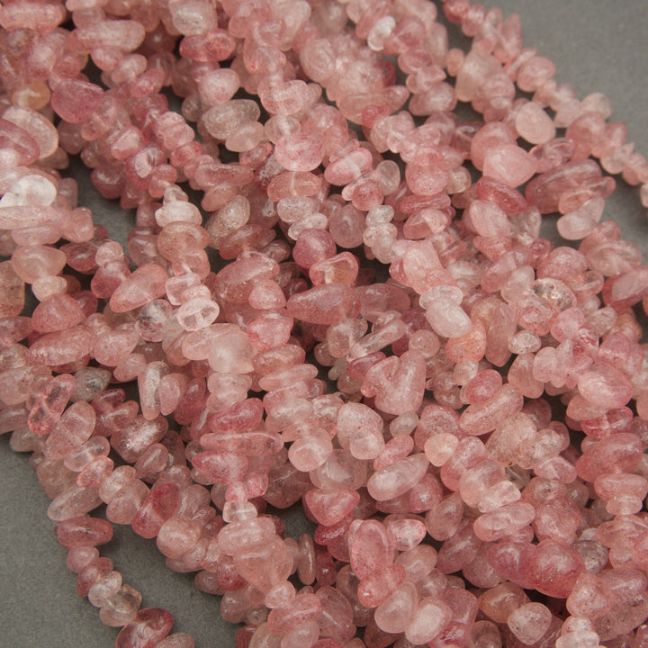 Close-up of pink stone chips on a gray background