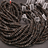 dark grey beads with tags