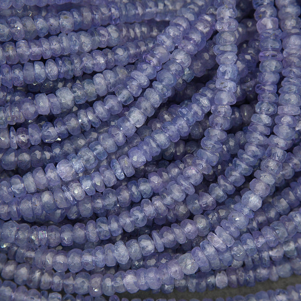 Faceted tanzanite rondelle beads in soft lavender blue tones, natural gemstone strand