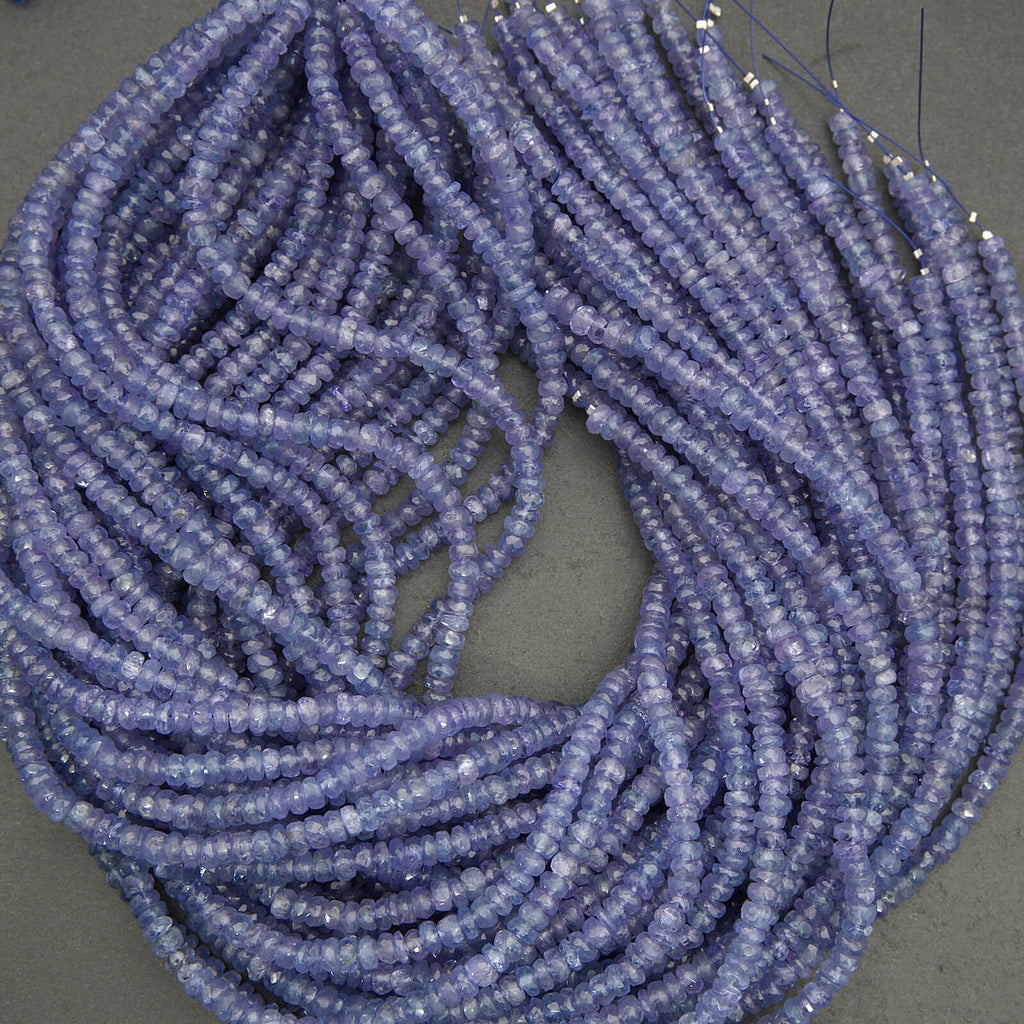 Faceted tanzanite rondelle beads with delicate violet blue color variation