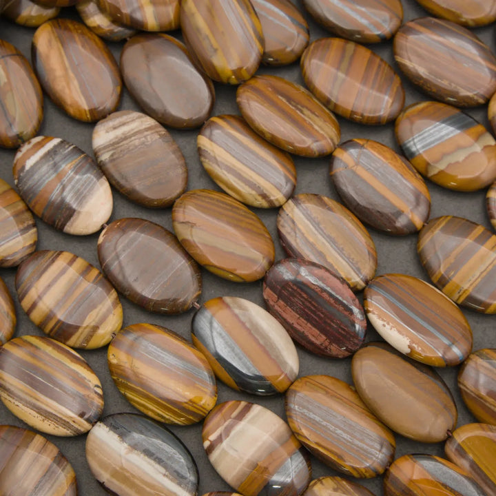 Natural Tiger Iron oval beads with distinctive striped patterns formed from Tiger Eye, Hematite, and Jasper.