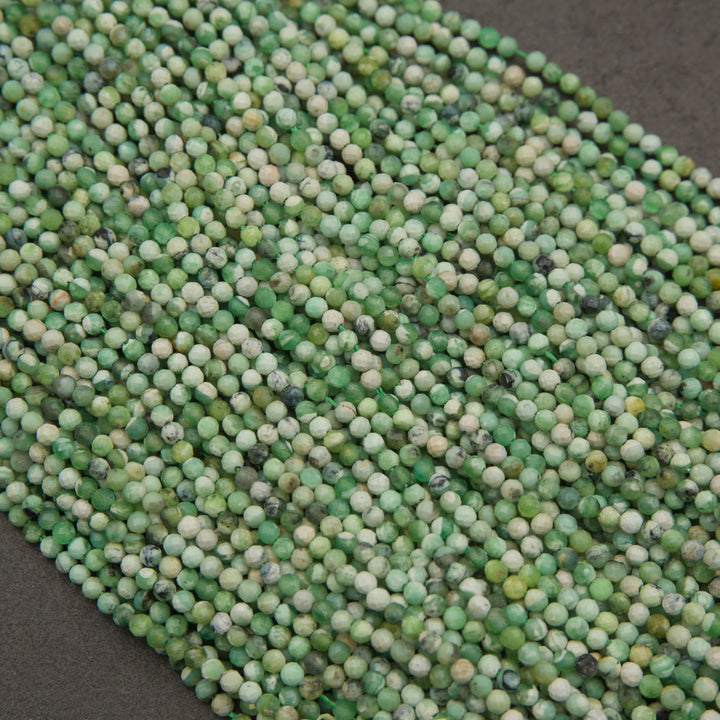 Rows of tiny microfaceted variscite beads in green and pale mint