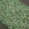 Rows of tiny microfaceted variscite beads in green and pale mint