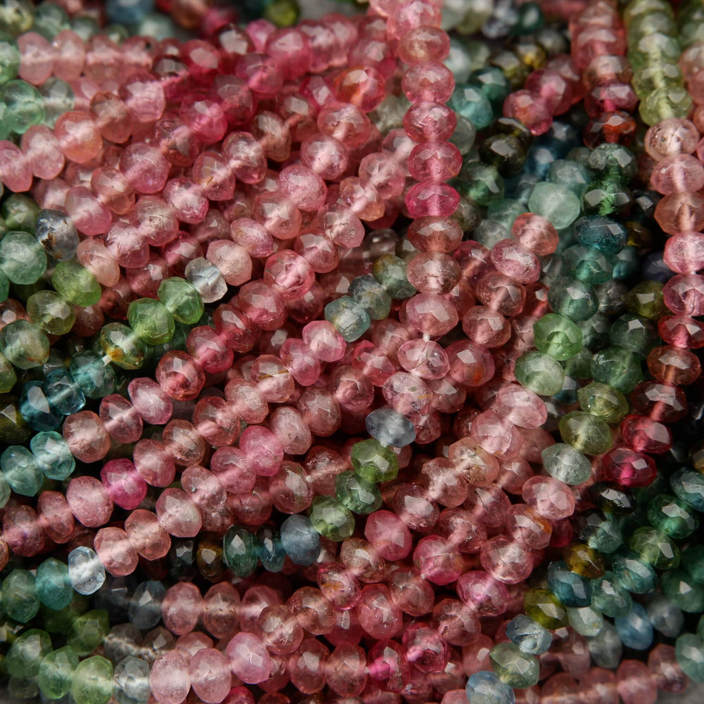 Close-up of multicolored bead strands intertwined