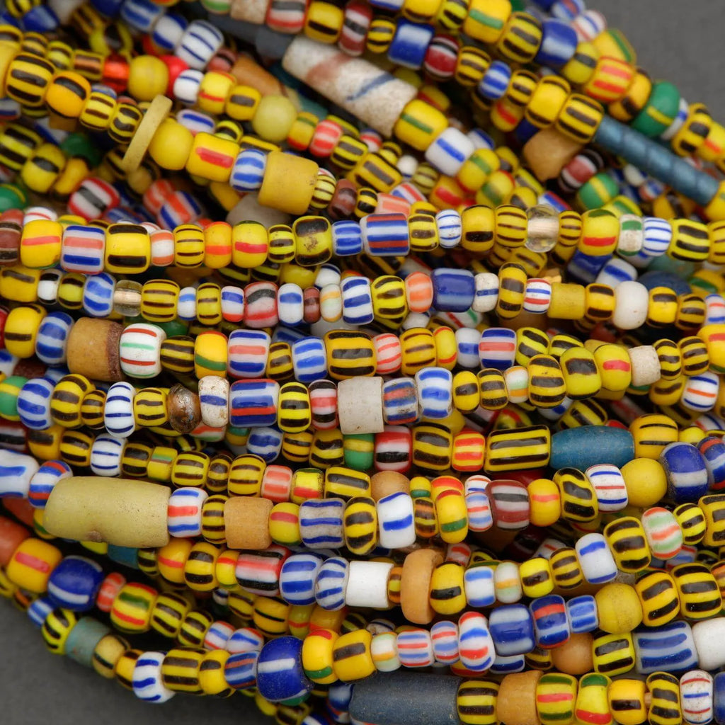Close-up of colorful beads in various patterns and colors.