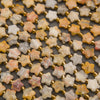 Close-up of faceted yellow crazy lace agate star beads showing lace banding in cream, yellow and coral