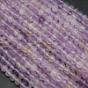 Faceted purple ametrine beads.