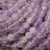 Faceted purple ametrine beads.