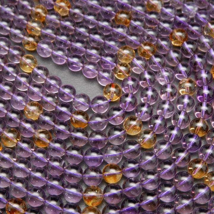Ametrine and citrine beads.