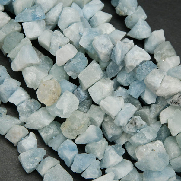 Light blue raw aquamarine material. Rough cut aquamarine beads.