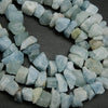 Light blue raw aquamarine material. Rough cut aquamarine beads.
