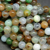 Green, brown, and white australian chrysoprase round beads. Loose beads for DIY and handmade jewelry making.