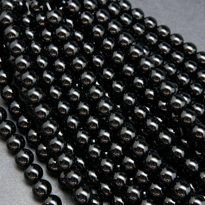 Black onyx round loose beads.