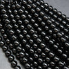 Black onyx round loose beads.